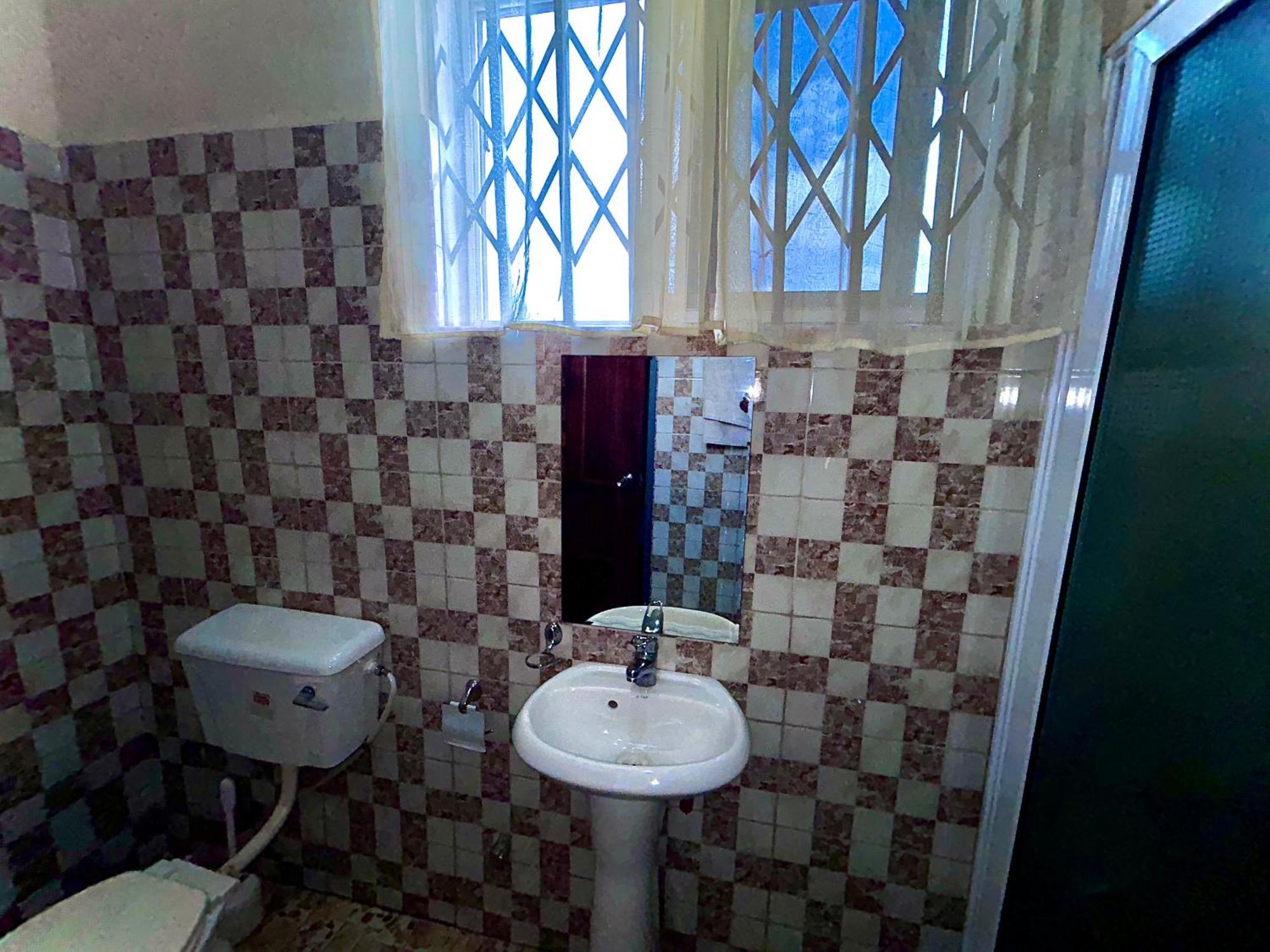 Jessie Hotel Adenta Ruang foto